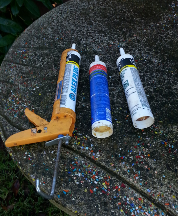 caulking gun and tubes.jpg