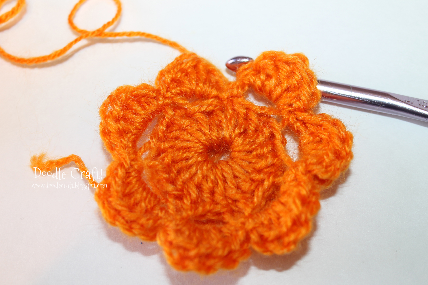 crochet a rosette step 15 begin second layer of petals.jpg