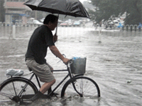 cycling-in-the-rain.gif