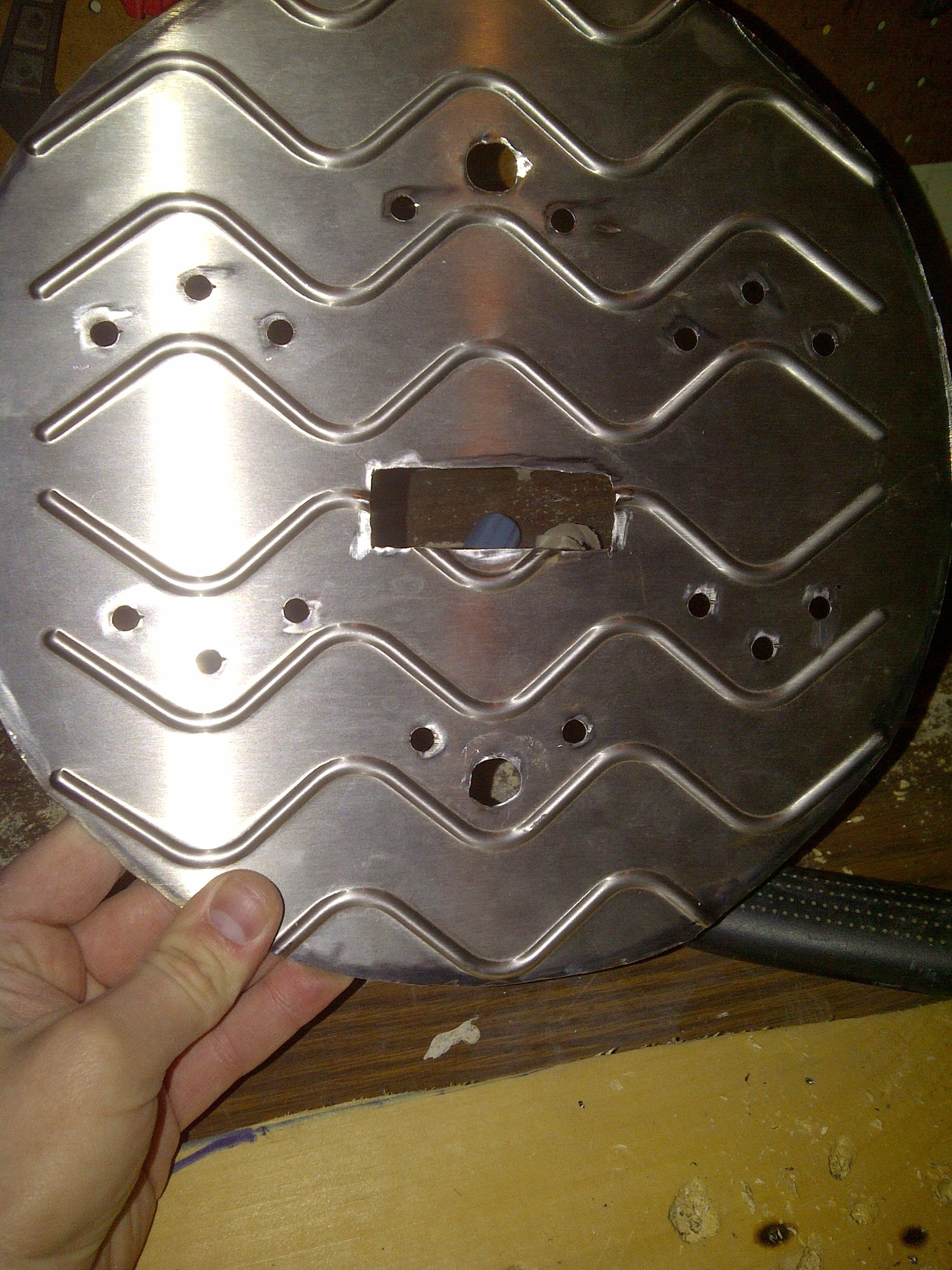 drilled holes coverplate.JPG