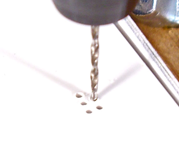 drilling_tiny_holes_many_closeup.jpg