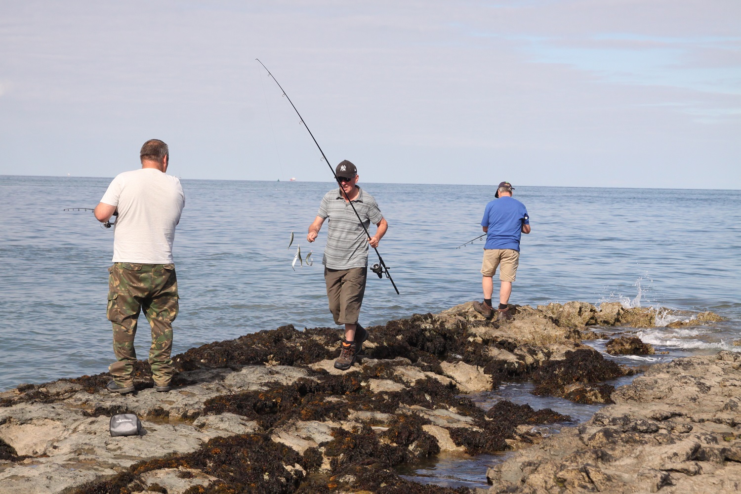 fishermen on rocks.jpg