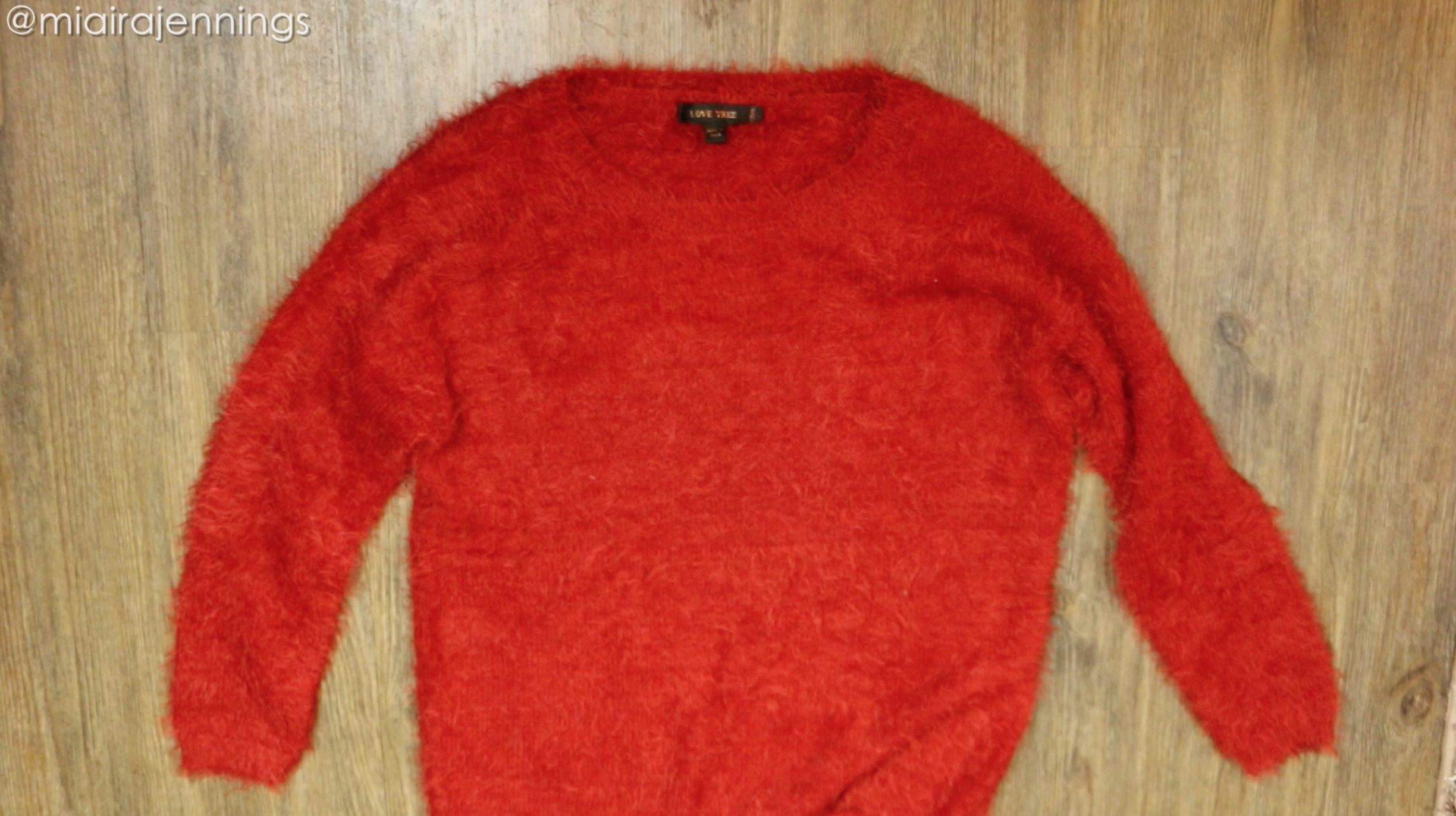 fuzzy red sweater.png