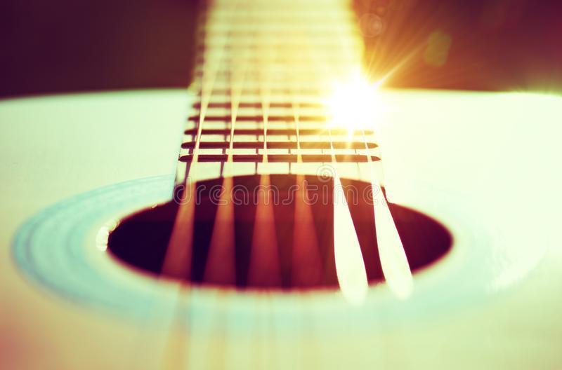 guitar-strings-concept-photo-playing-theme-sun-rays-reflections-56288217.jpg