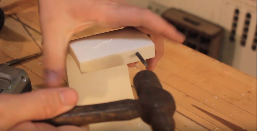 hammer cut ends of nails into corian and use glue if needed.jpg