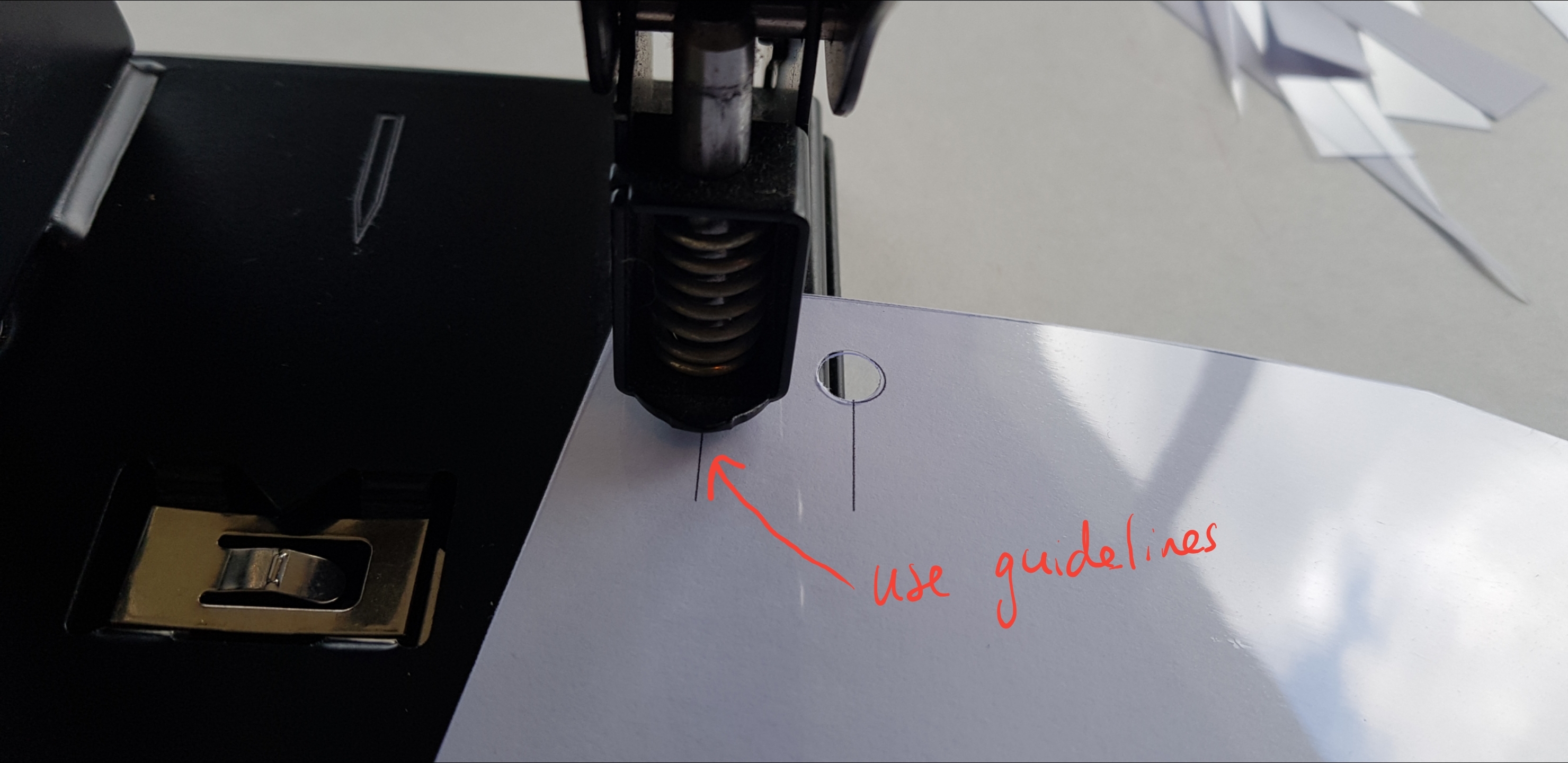 hole punch to shield using short guidelines.jpg