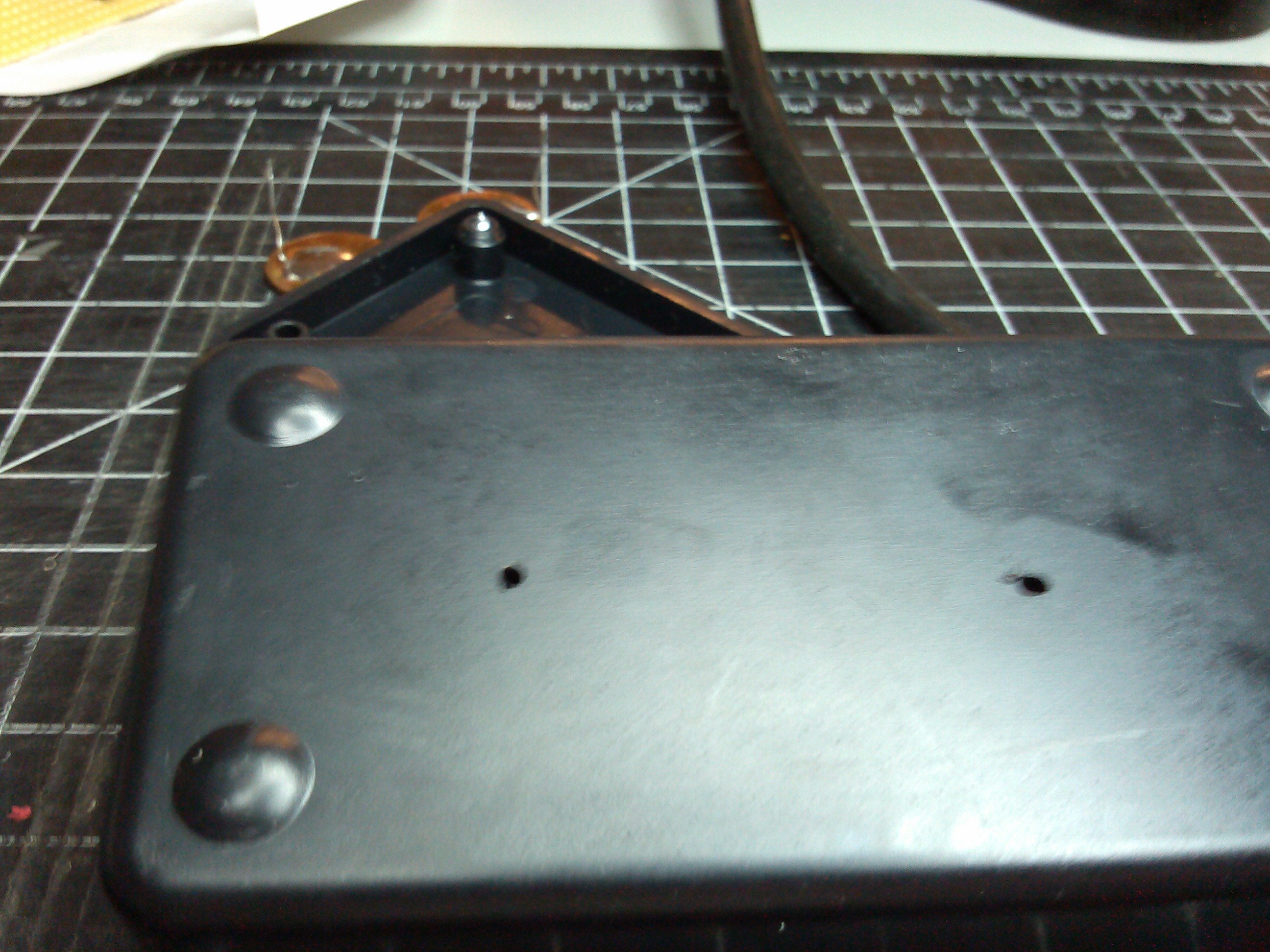 holes drilled for lead of penny.jpg