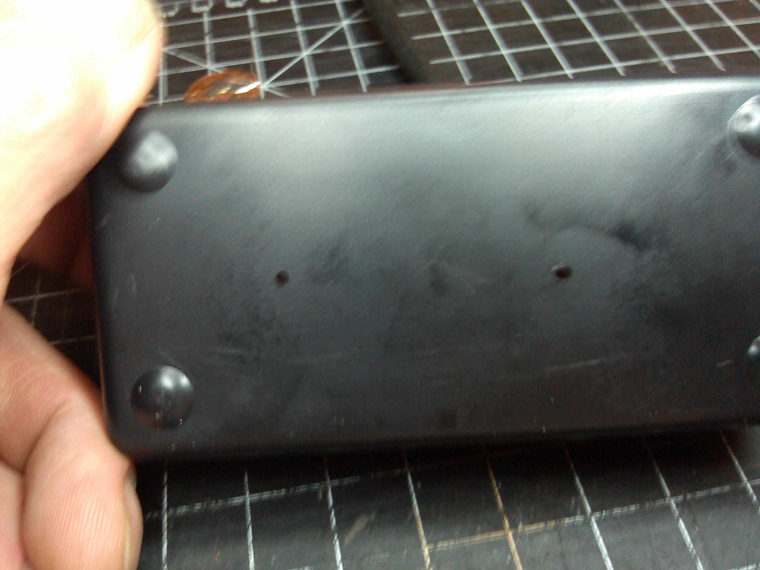 holes drilled for penny leads in top.jpg