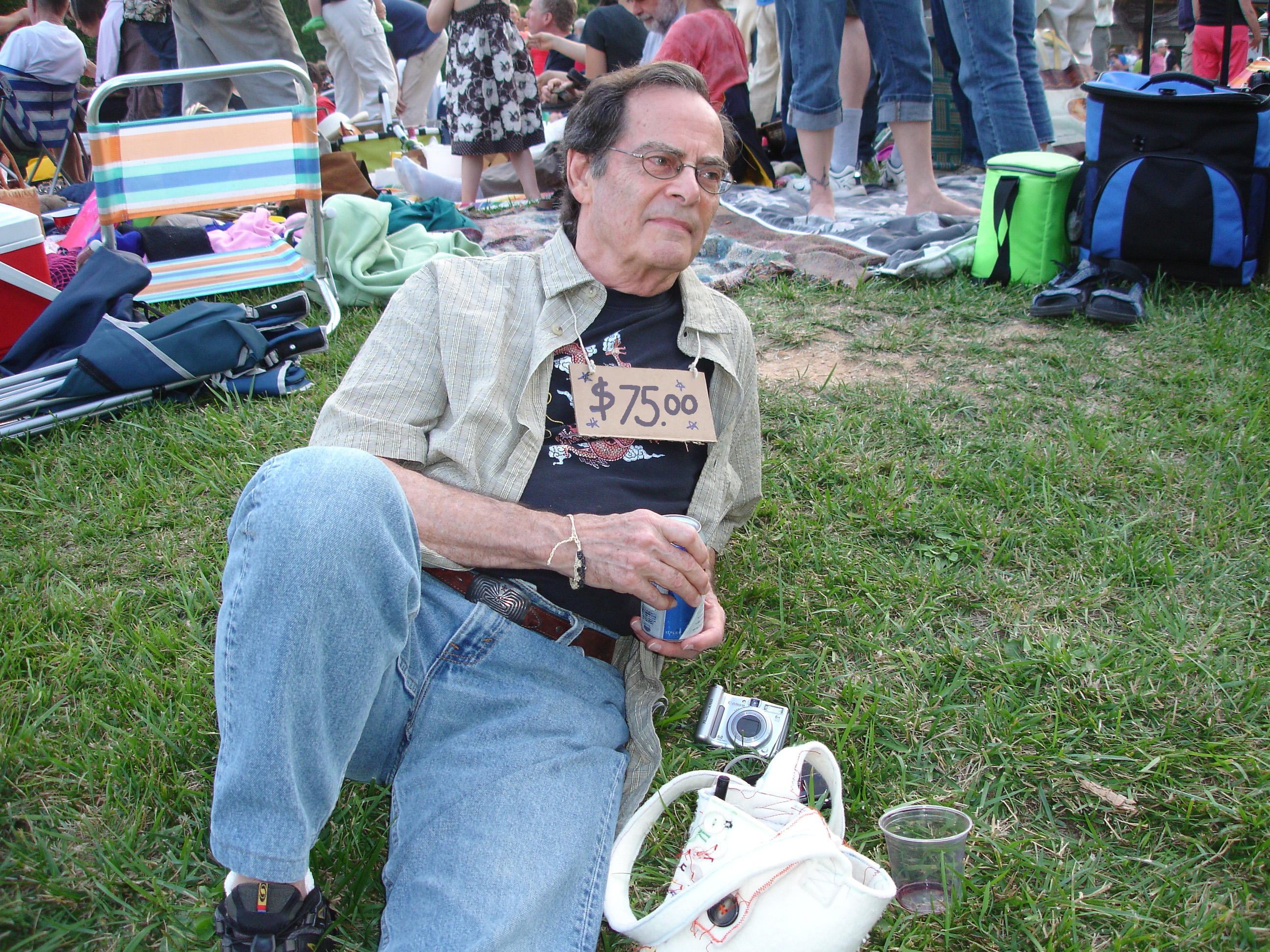 husband with sign.JPG