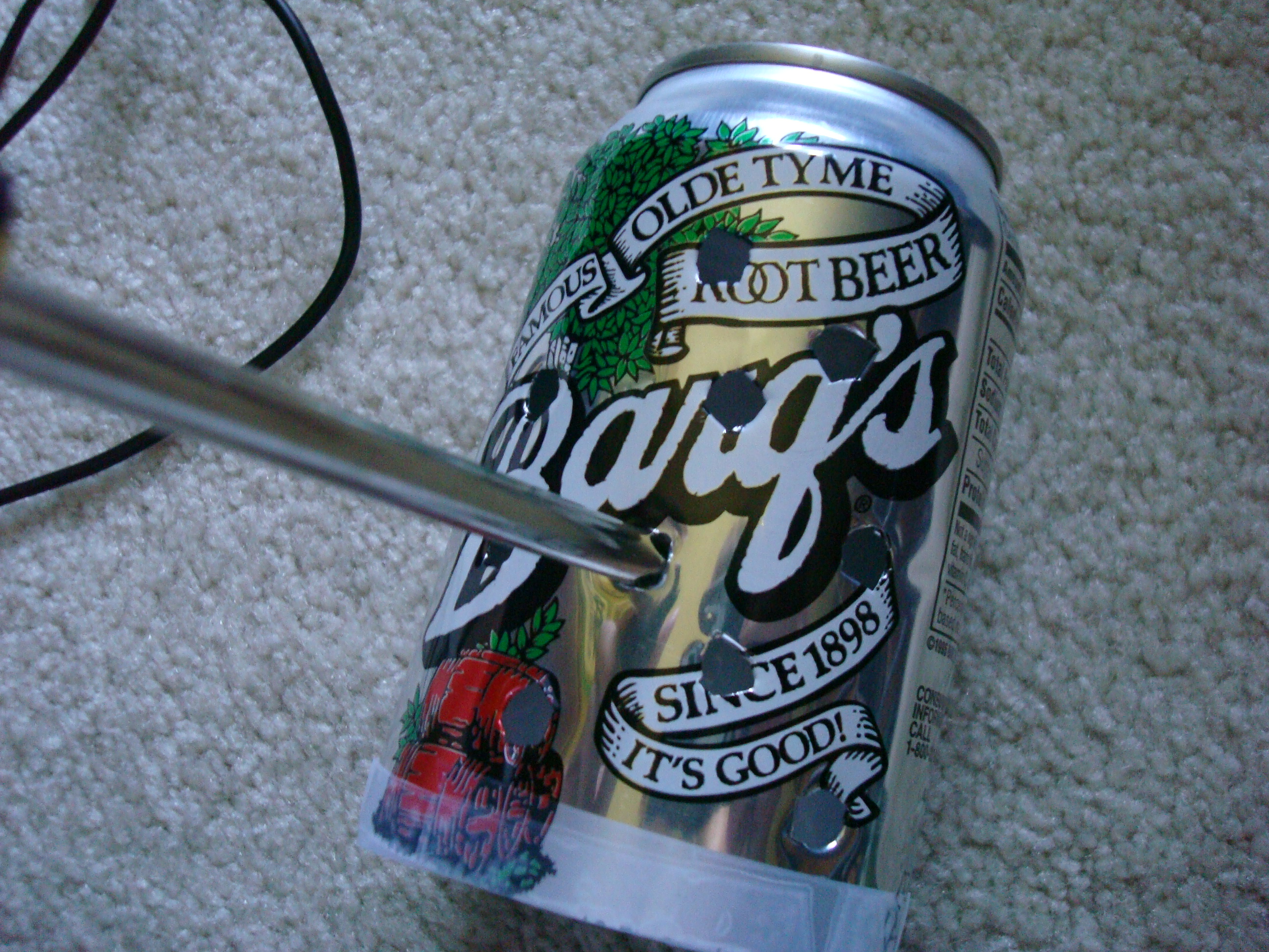 instructables- how to make a speaker cover with pop cans! 009.jpg