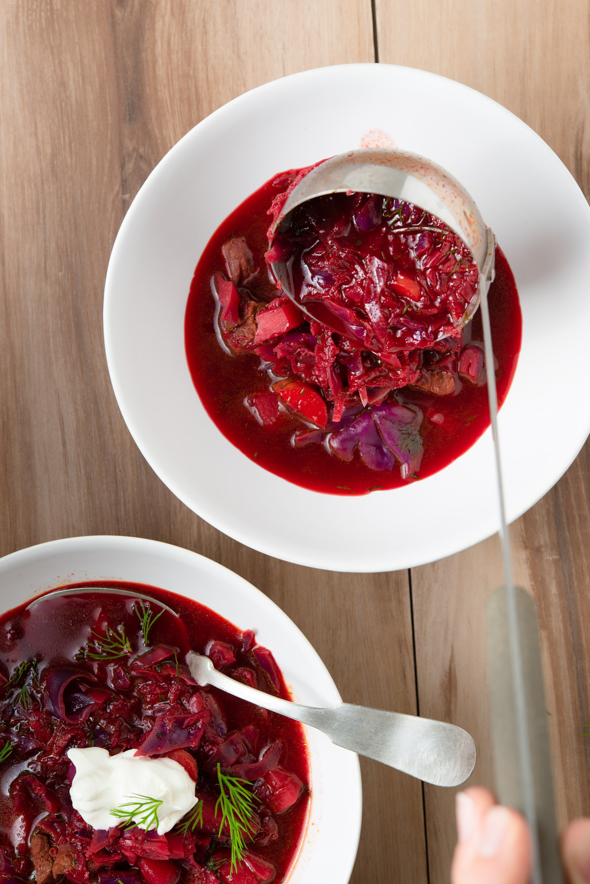 ladling borscht with lamb soup.JPG