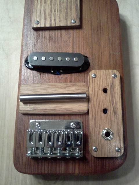 lap steel no. 2 string saddle and bridge.jpg