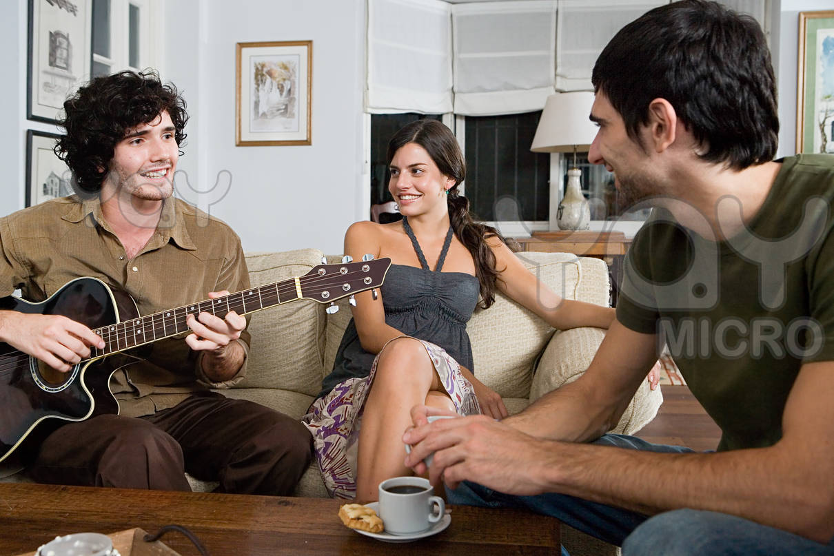 man-playing-guitar-for-friends-ae9acd.jpg