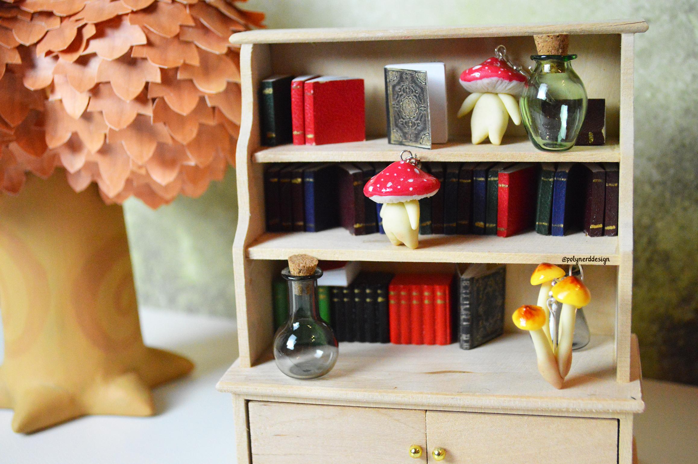 mushroom earrings in library.jpg