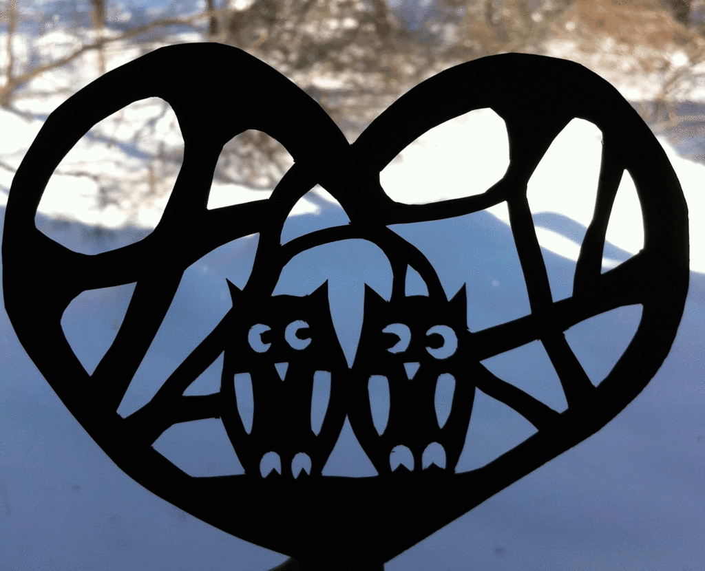 owl-stencil-in-window.gif