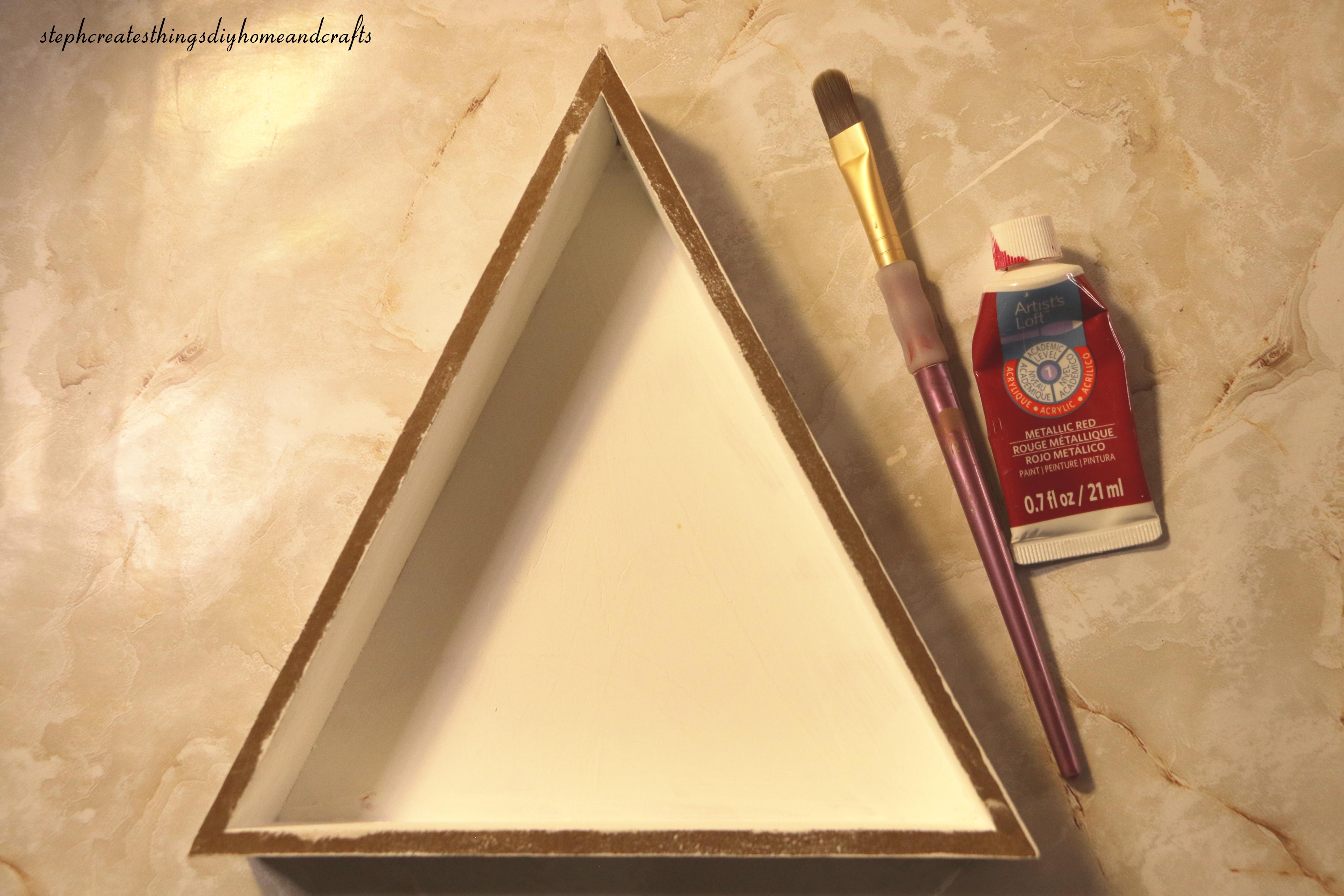 painted wooden triangle decor.jpg