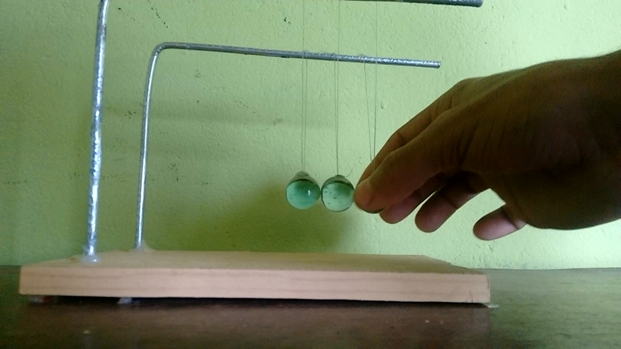 pendulo_newton_First_Frame.png