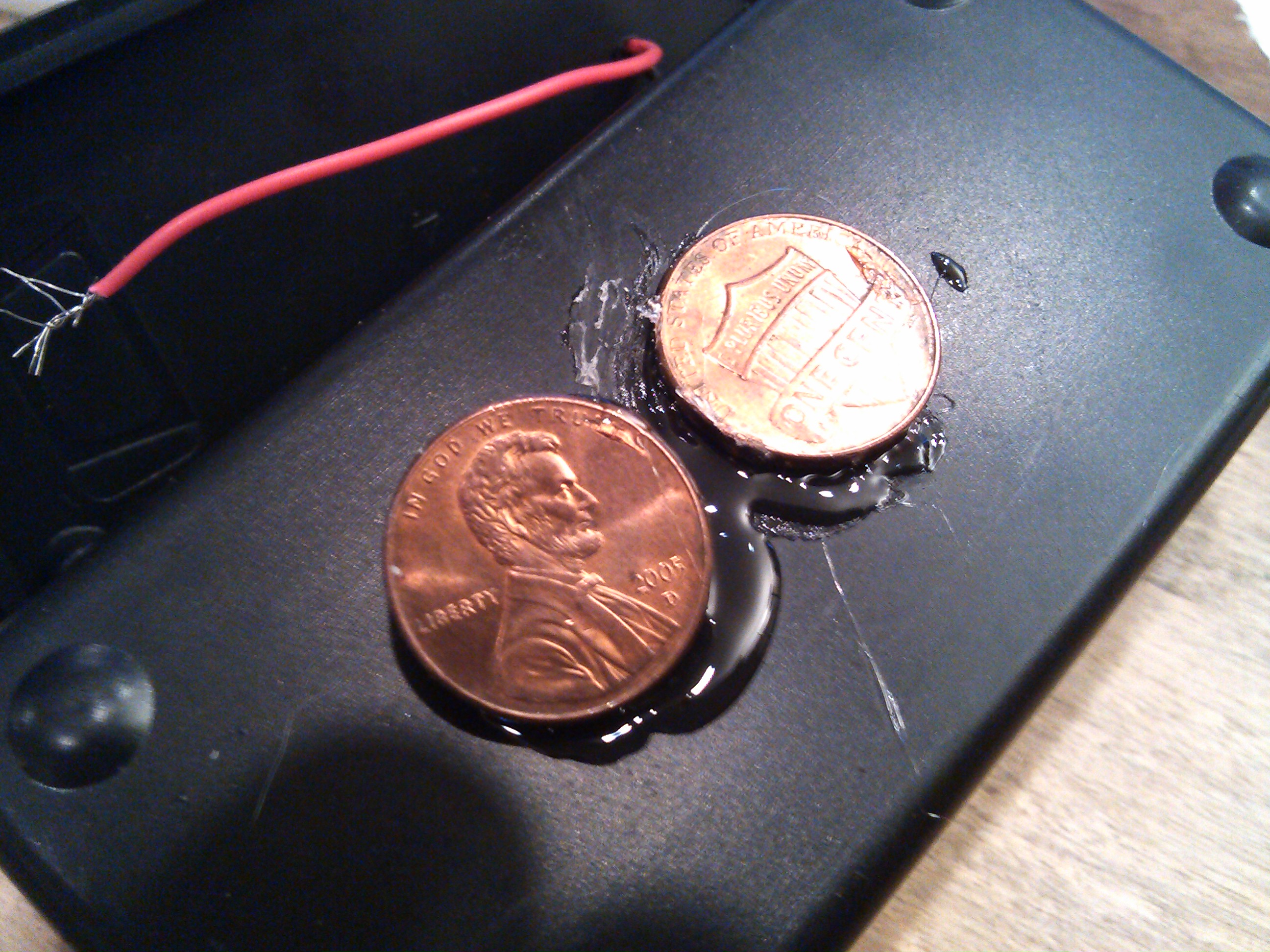 pennies glued in place.jpg