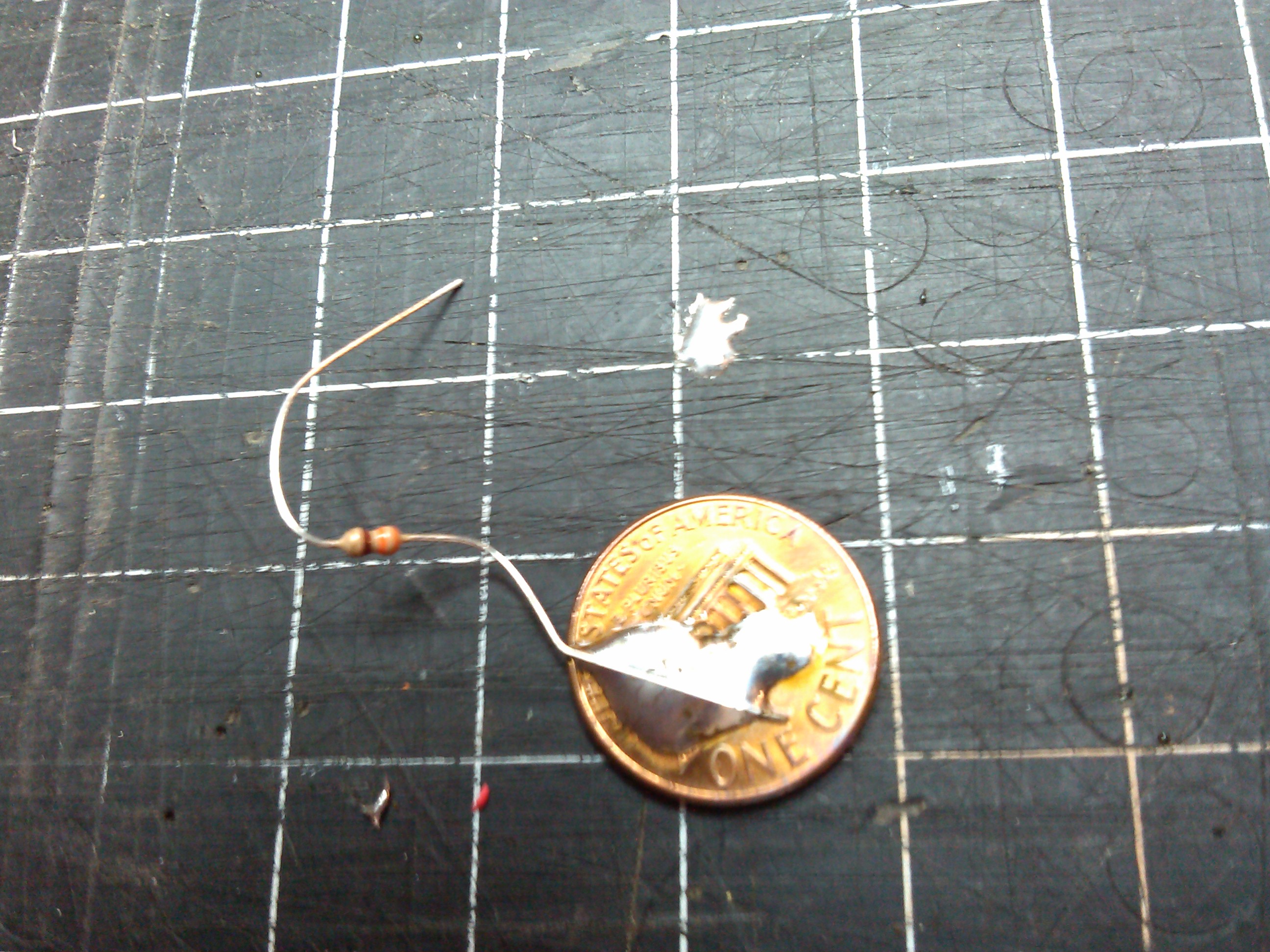 penny with wire lead soldered on to it.jpg