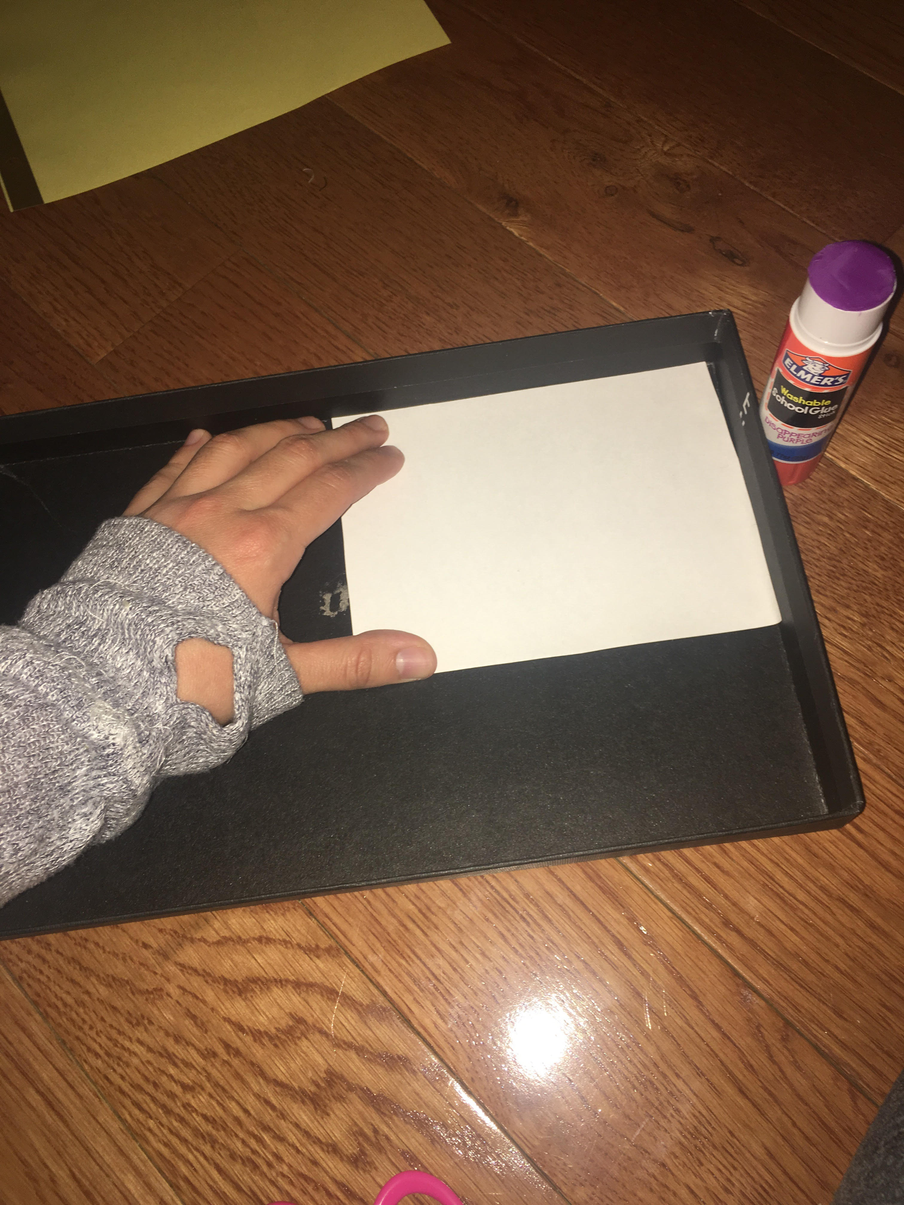 placing paper on lid.jpg