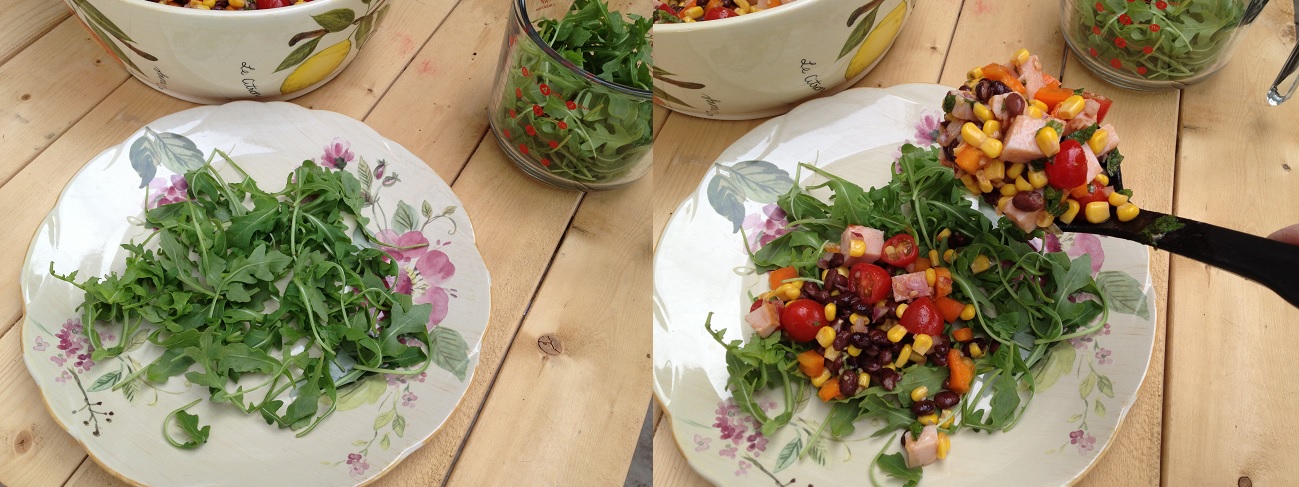 plated arugula and topping with other salad ingredients.jpg