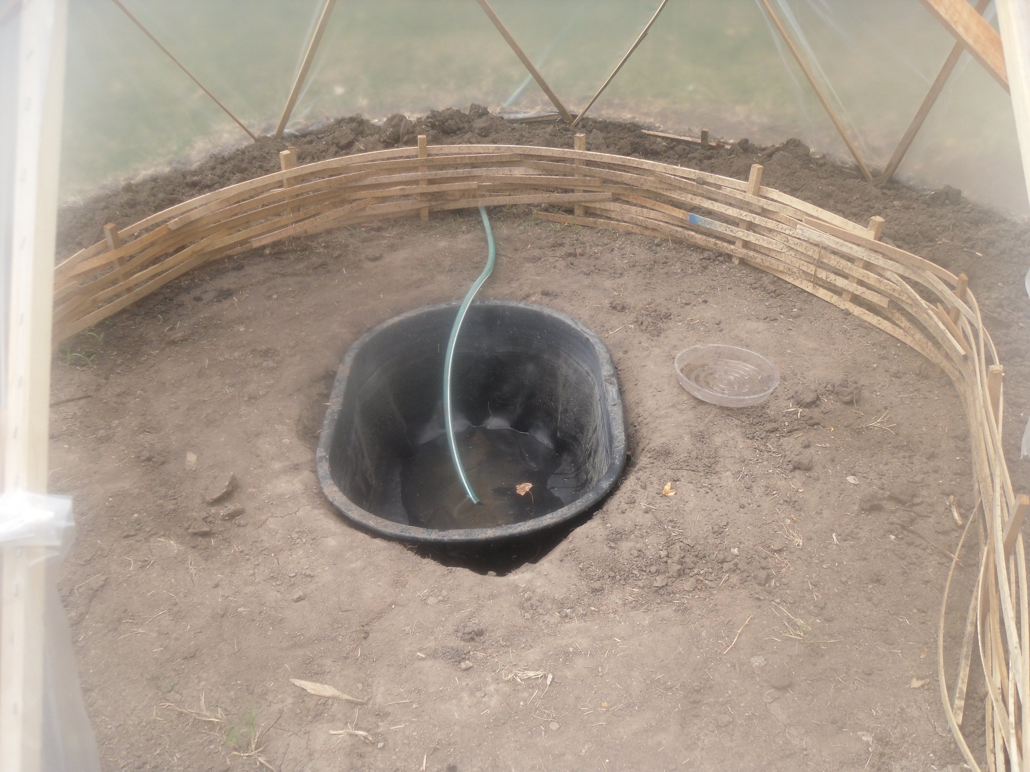 pond in greenhouse floor.jpg