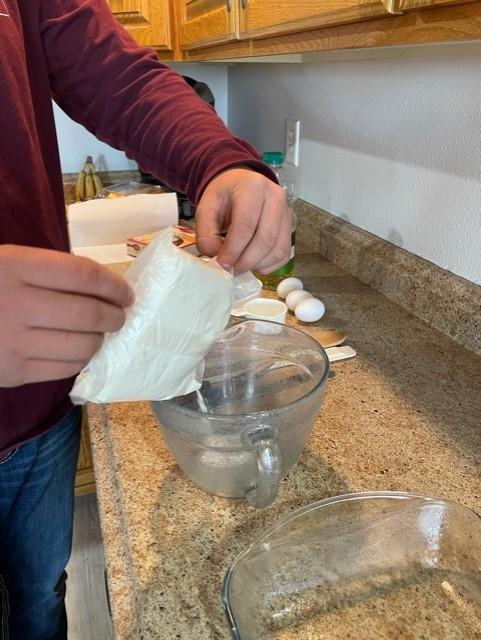 pour cake mix into bowl.jpg