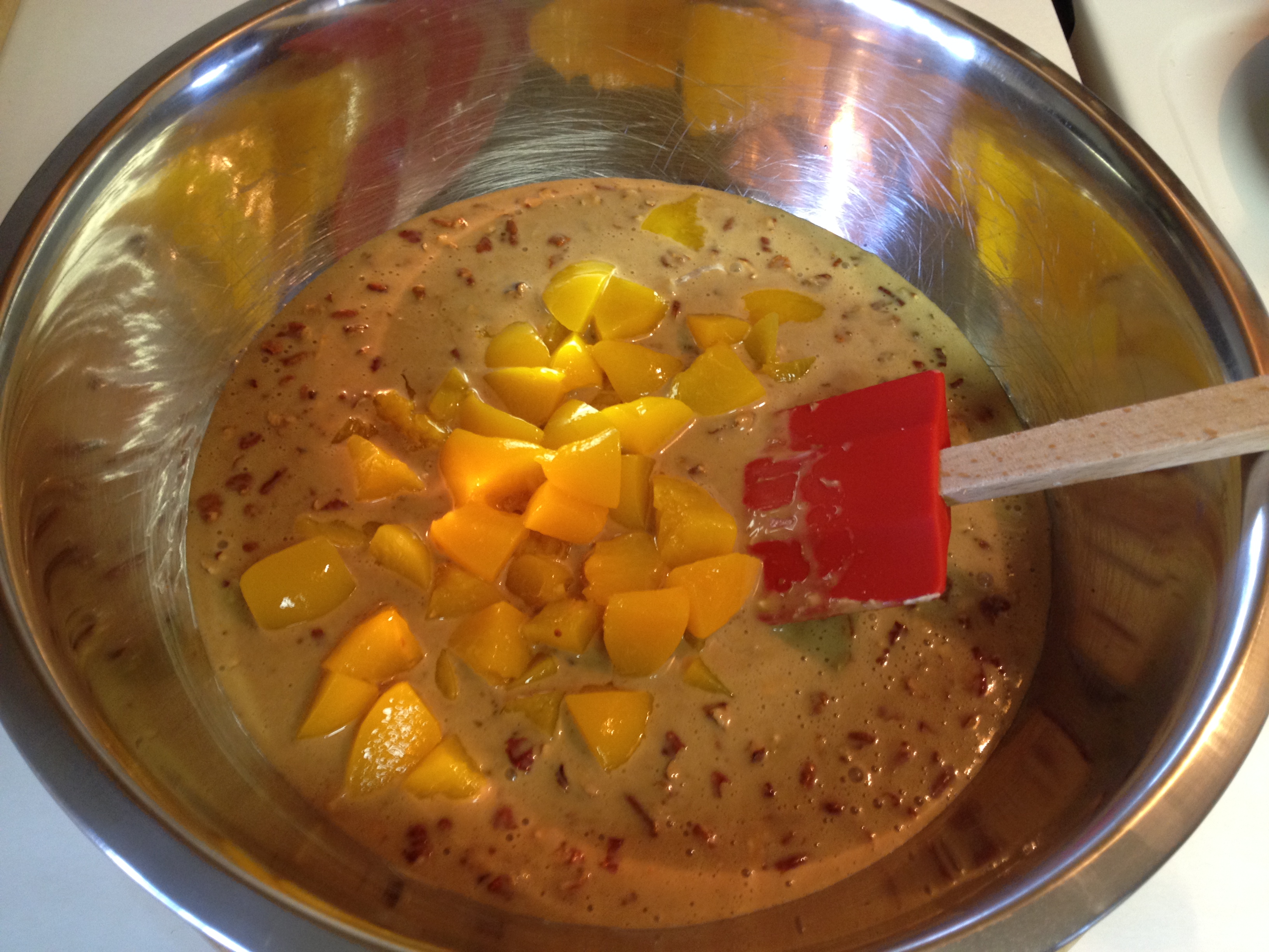 pour into large bowl mix in chopped peaches.JPG