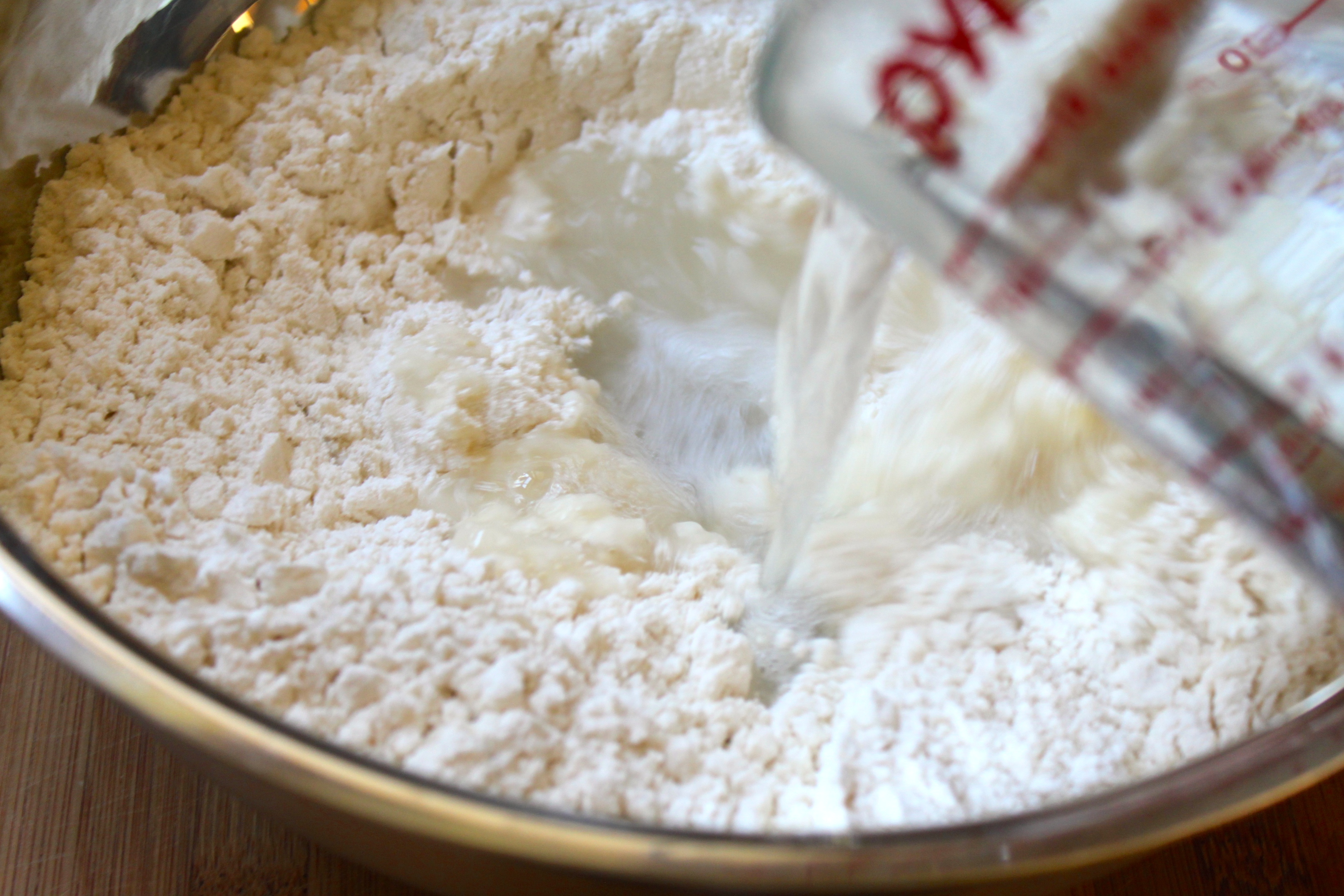 pouring-water-into-flour-for-gnocchi.jpg.jpg