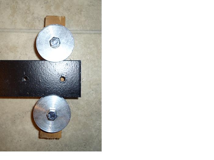 pulley fitted to metal bar.JPG