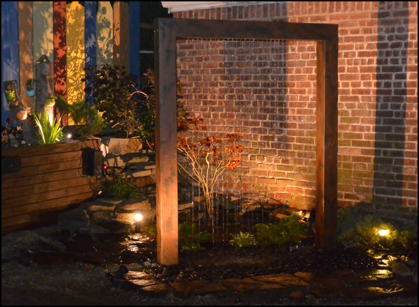 rain shower comtemporary fountain at night.jpg