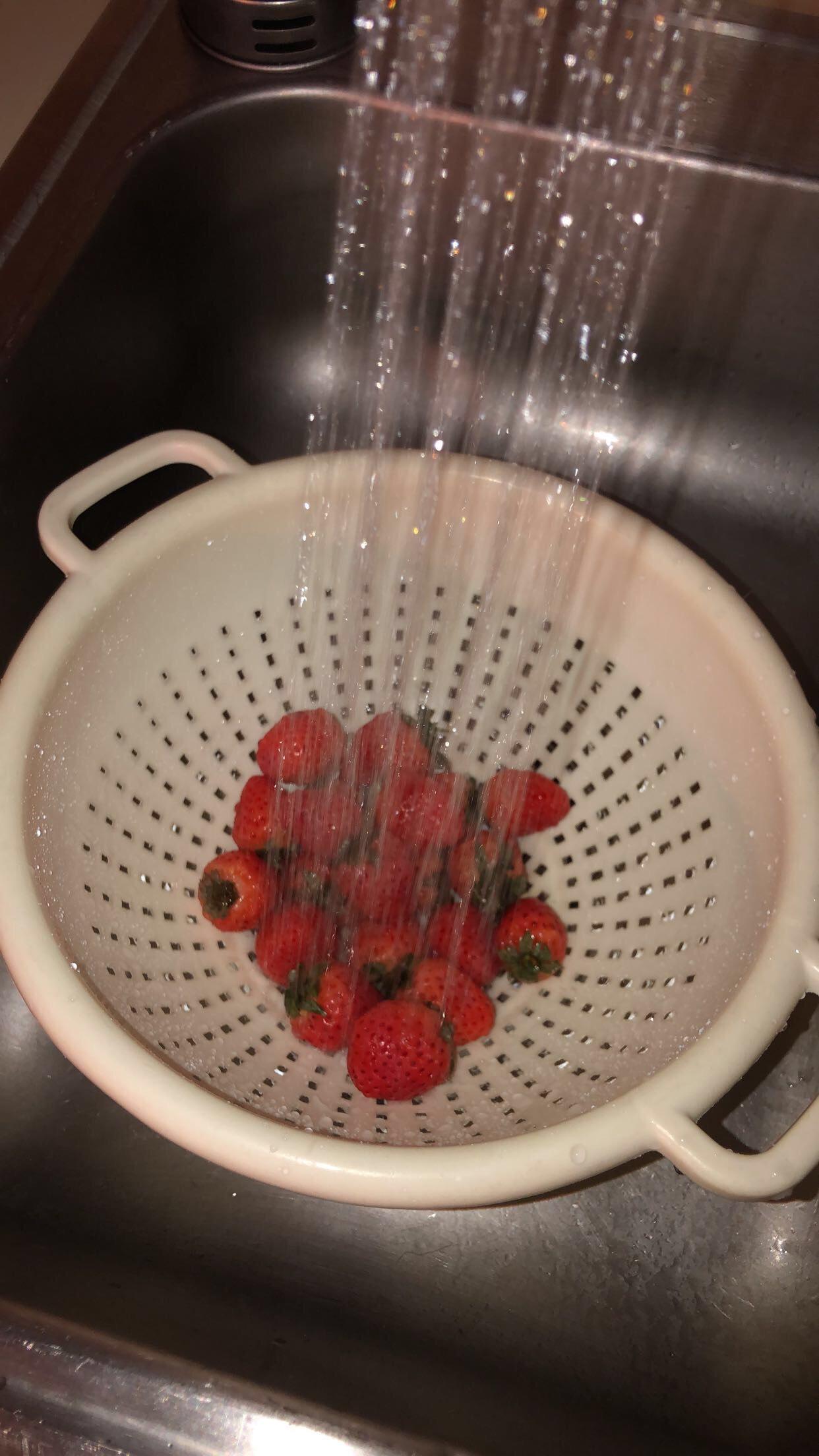 rinsing berries after soaking.jpg