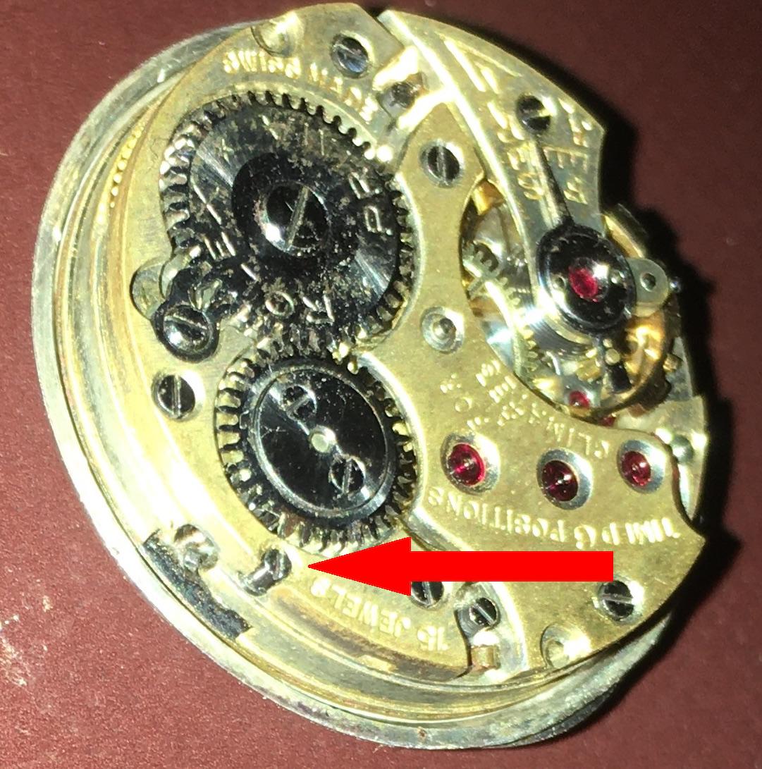 rolex_prima_crown_removal_screw.jpg