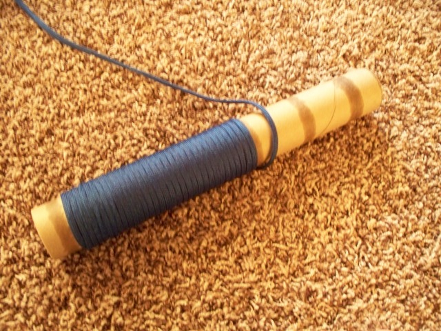 rolling up the blue paracord.jpg