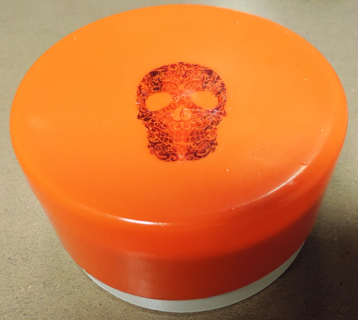 round orange cap w sticker 2.JPG