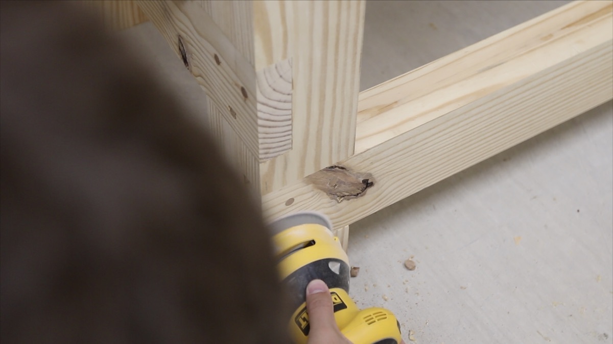 sanding dowel plugs.jpeg