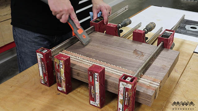 scraping glue from cutting board.jpg