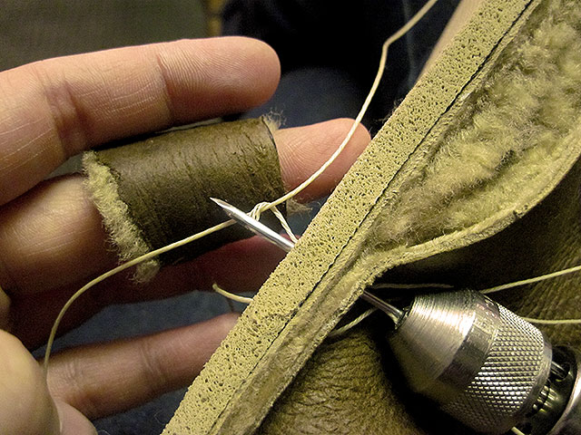 sewing-on-sole.jpg