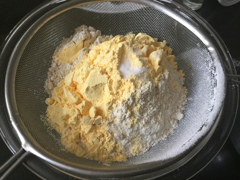 sifting flour and custard powder.jpg