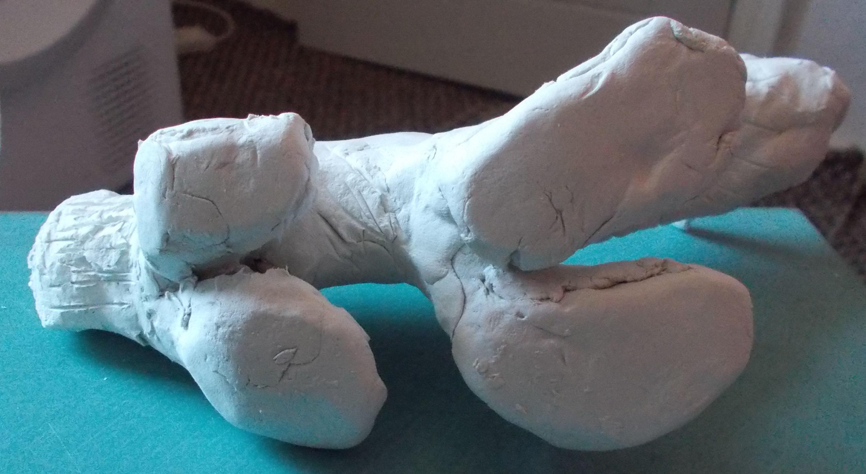 small clay wolf feet.jpg