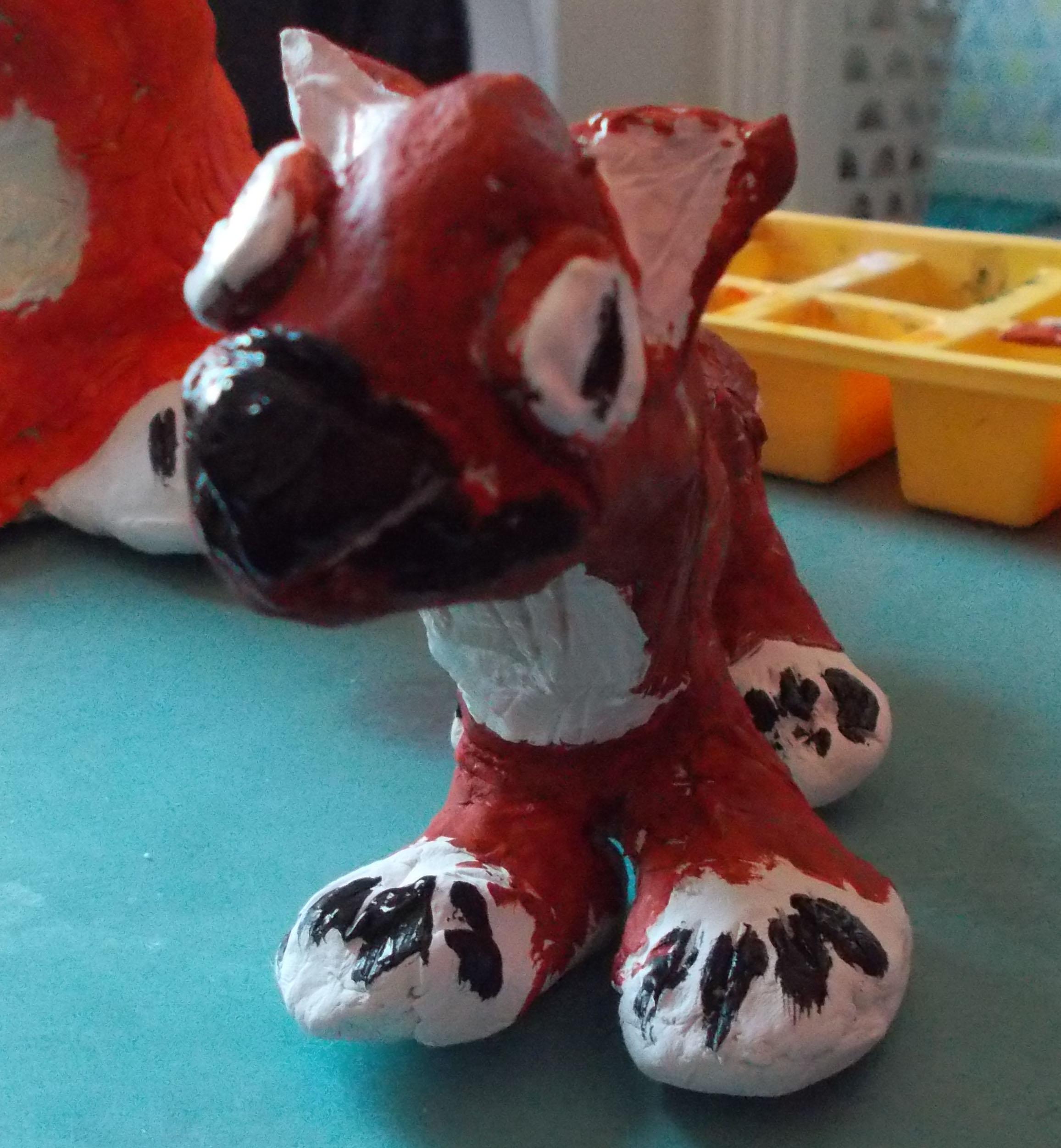 small clay wolf front painted.jpg