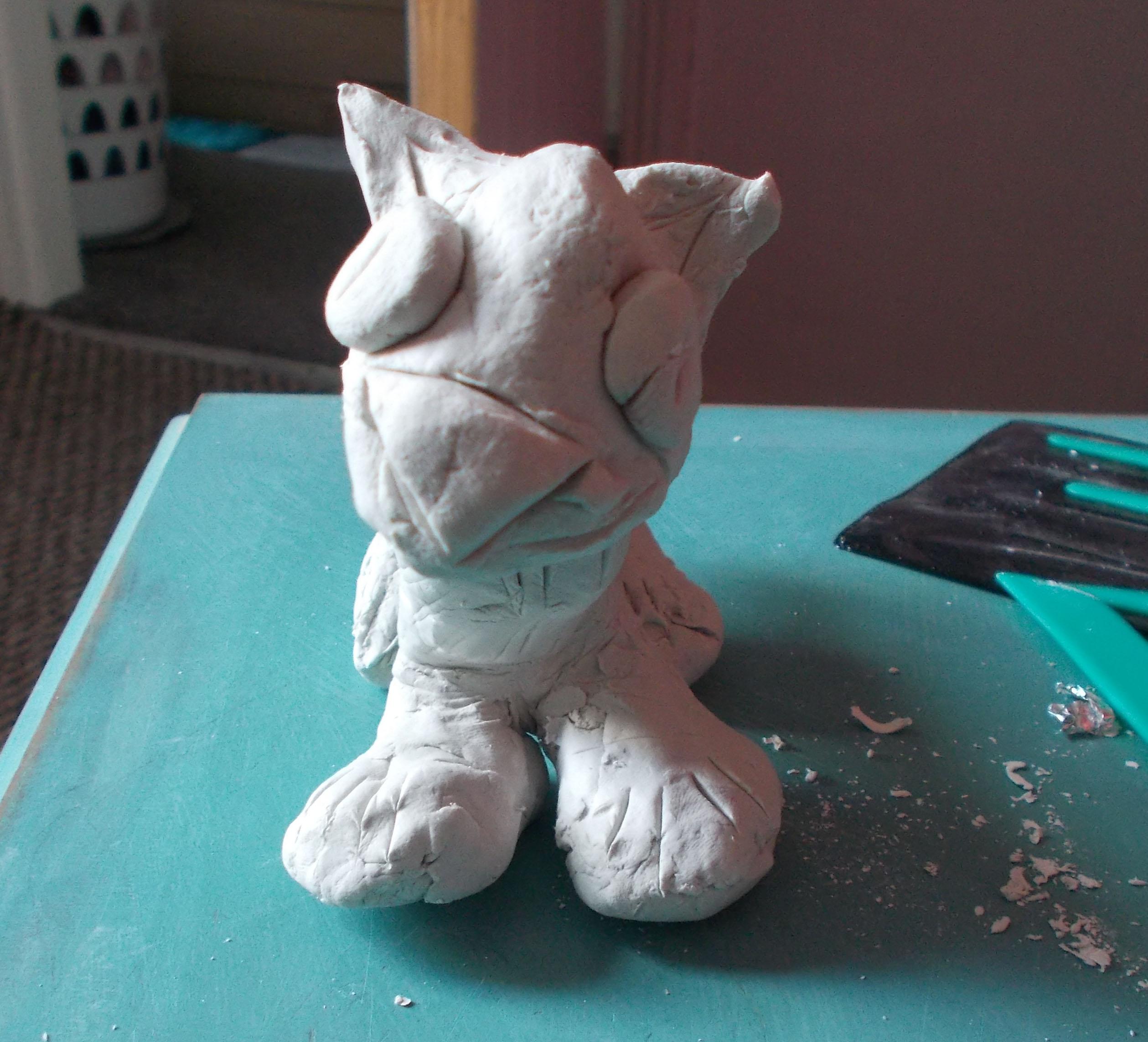 small clay wolf front unpainted.jpg