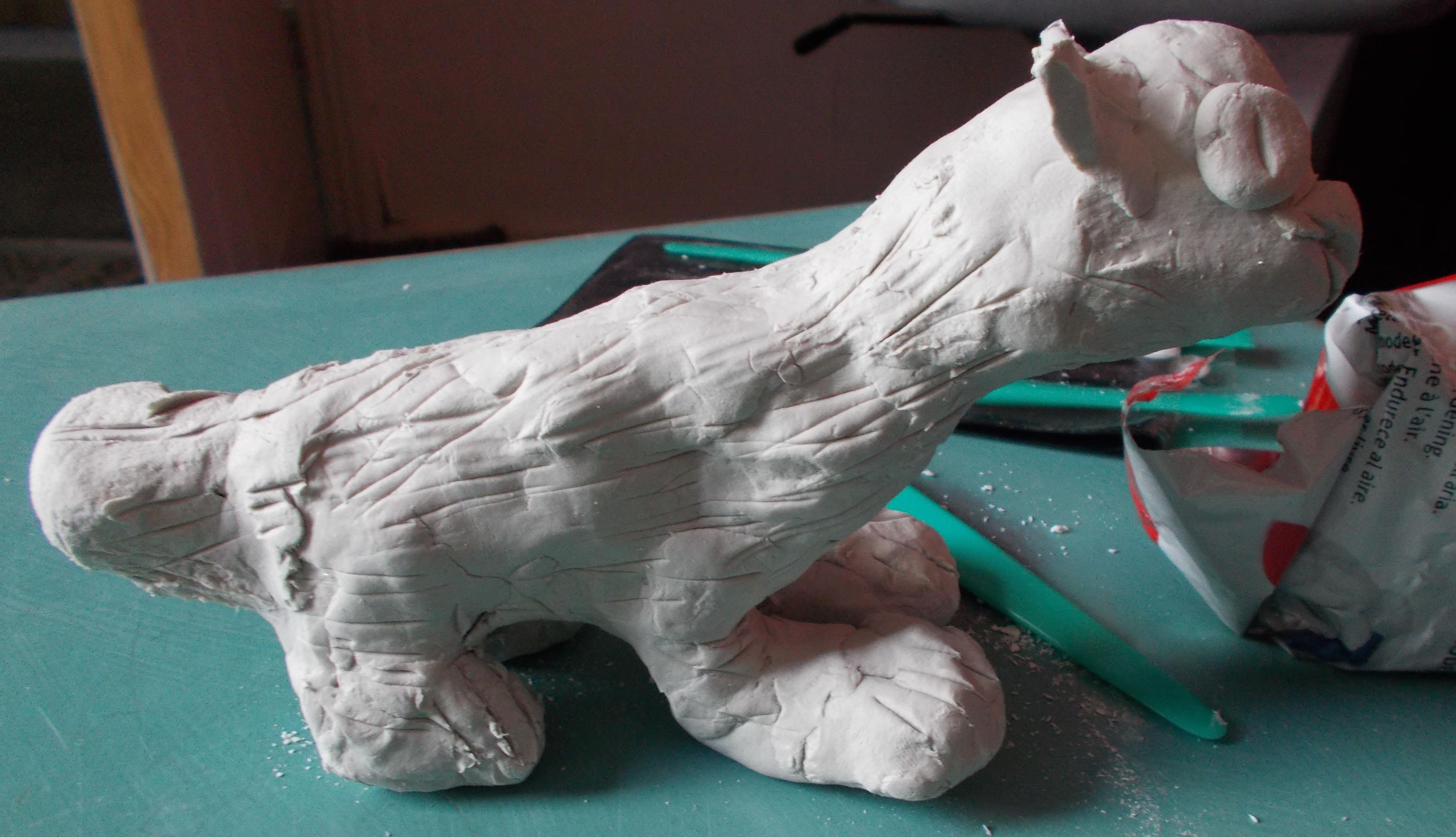 small clay wolf sideon unpainted 2.jpg