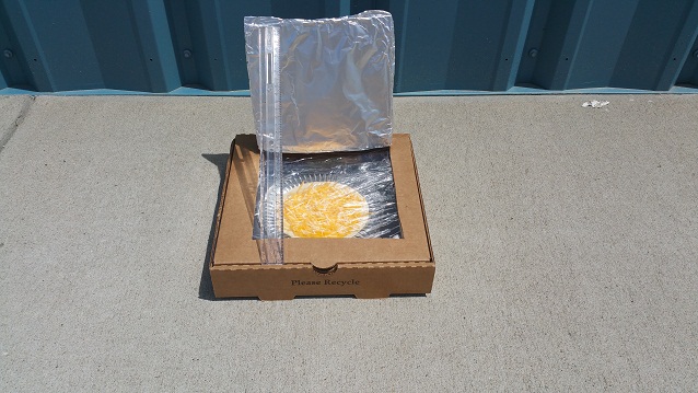 solar_oven_cooking_outside.jpg