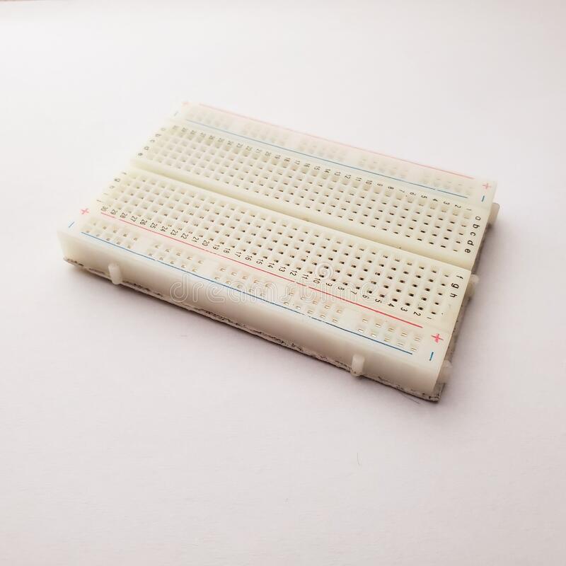 solderless-breadboard-isolated-white-background-262645628.jpg