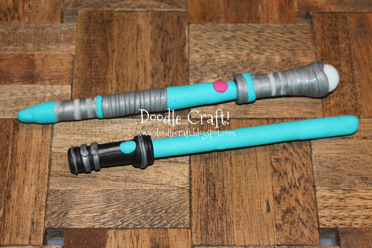 sonic screwdriver and lightsaber pens polymer clay.jpg