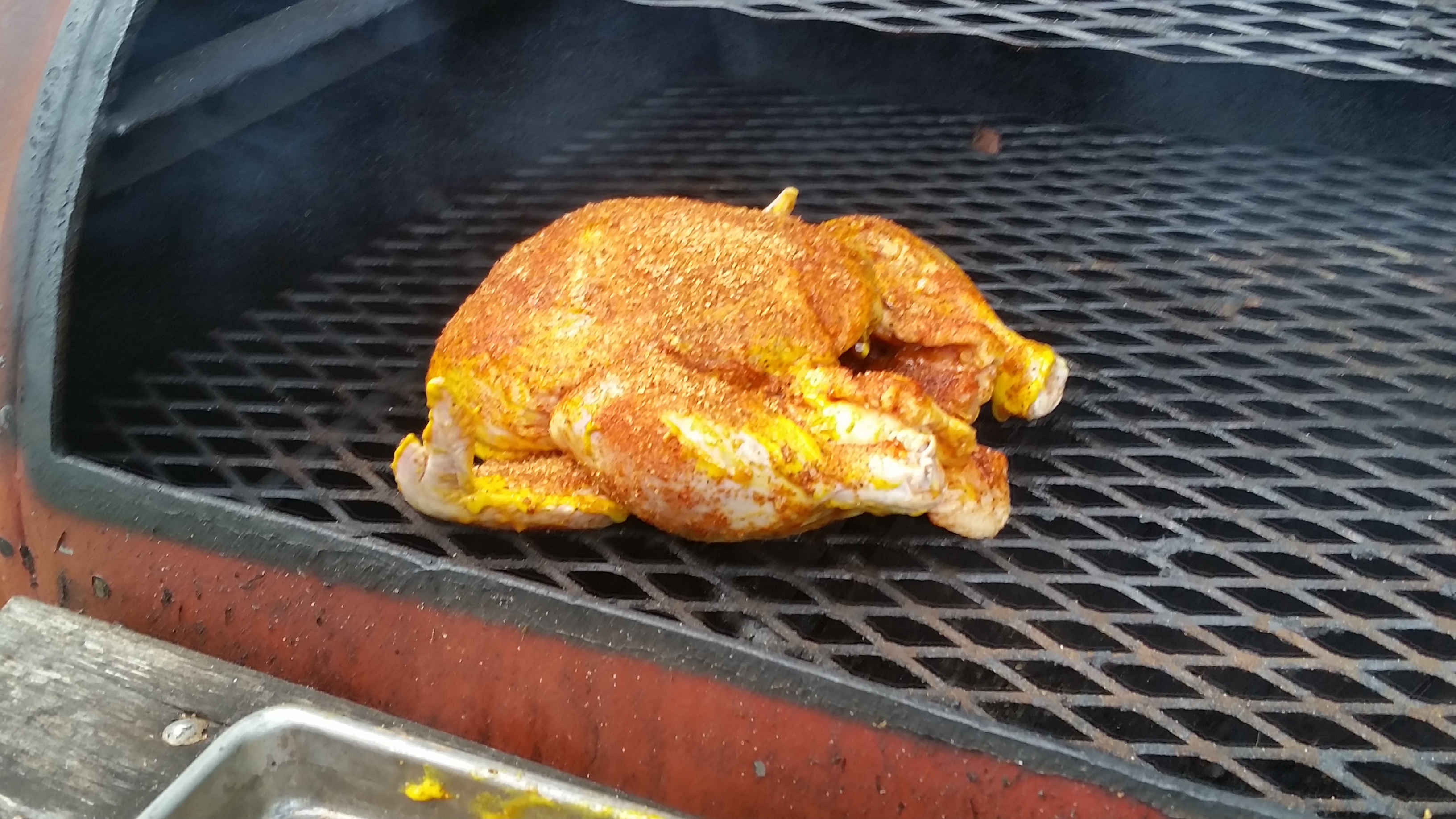 step 10 place chicken on BBQ Pit.jpg