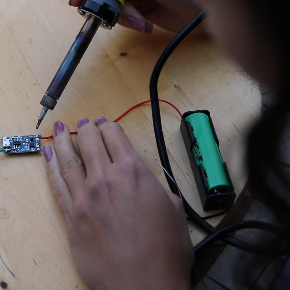 step_2_solder_battery_onto_charge_controller.png