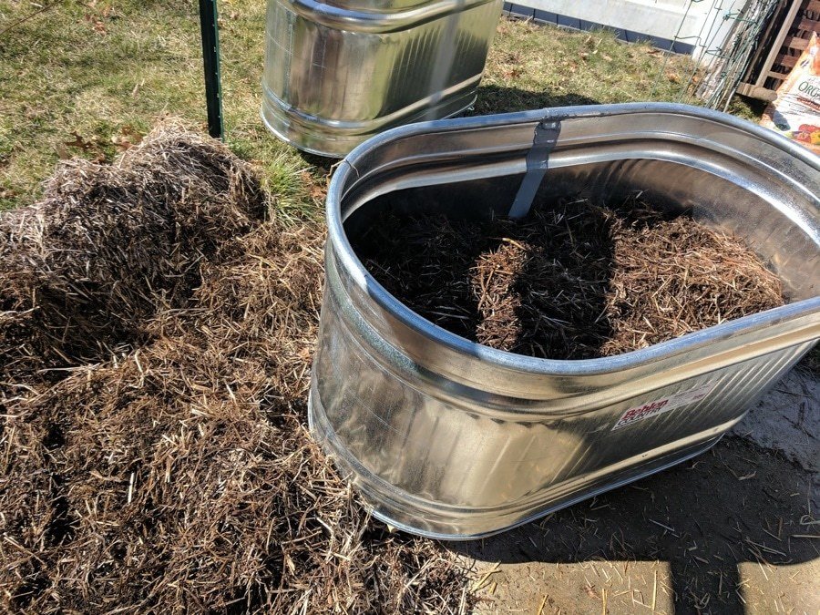 straw-in-water-trough-planters.jpg