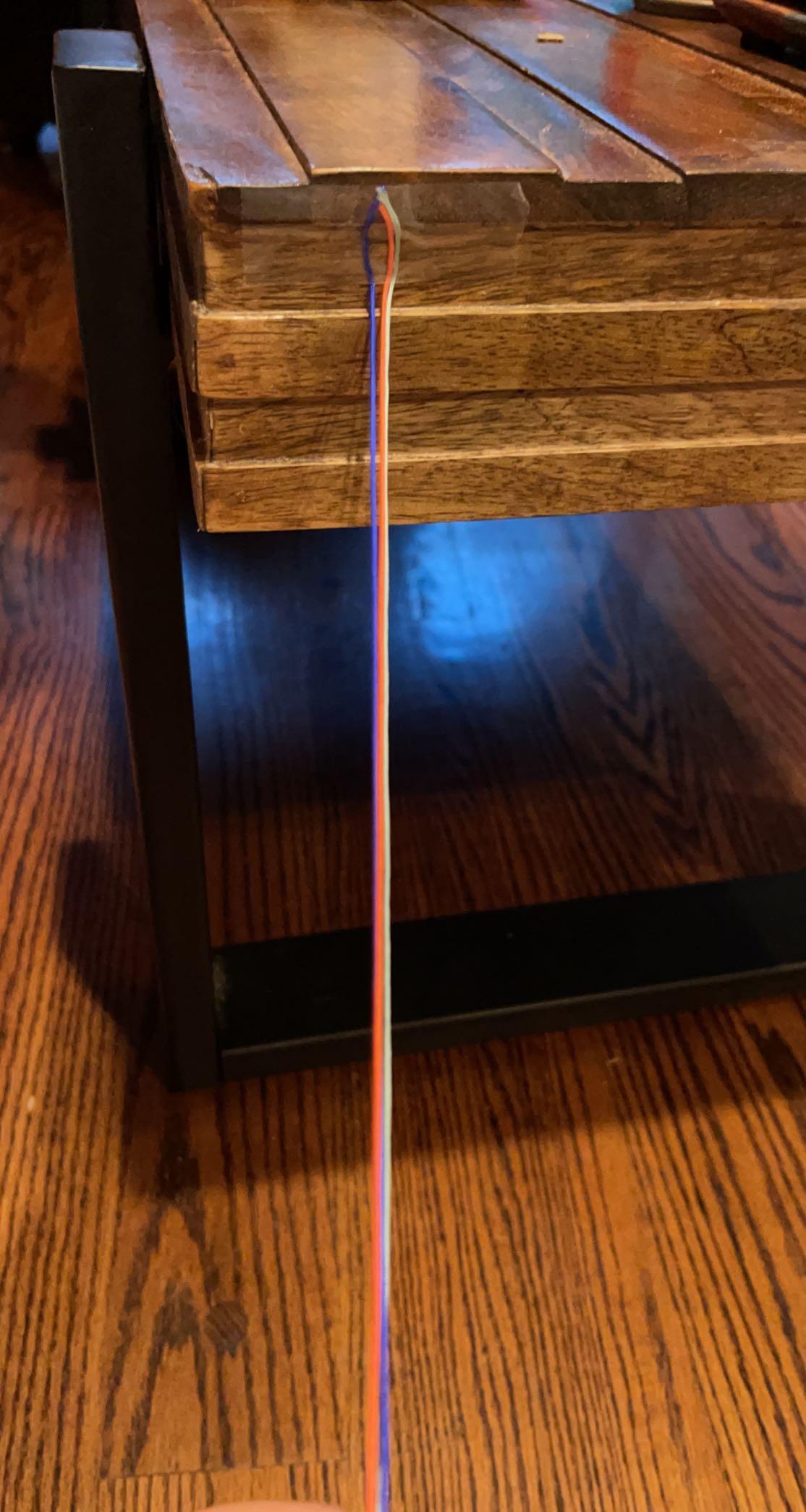 string being taped to a table.jpeg